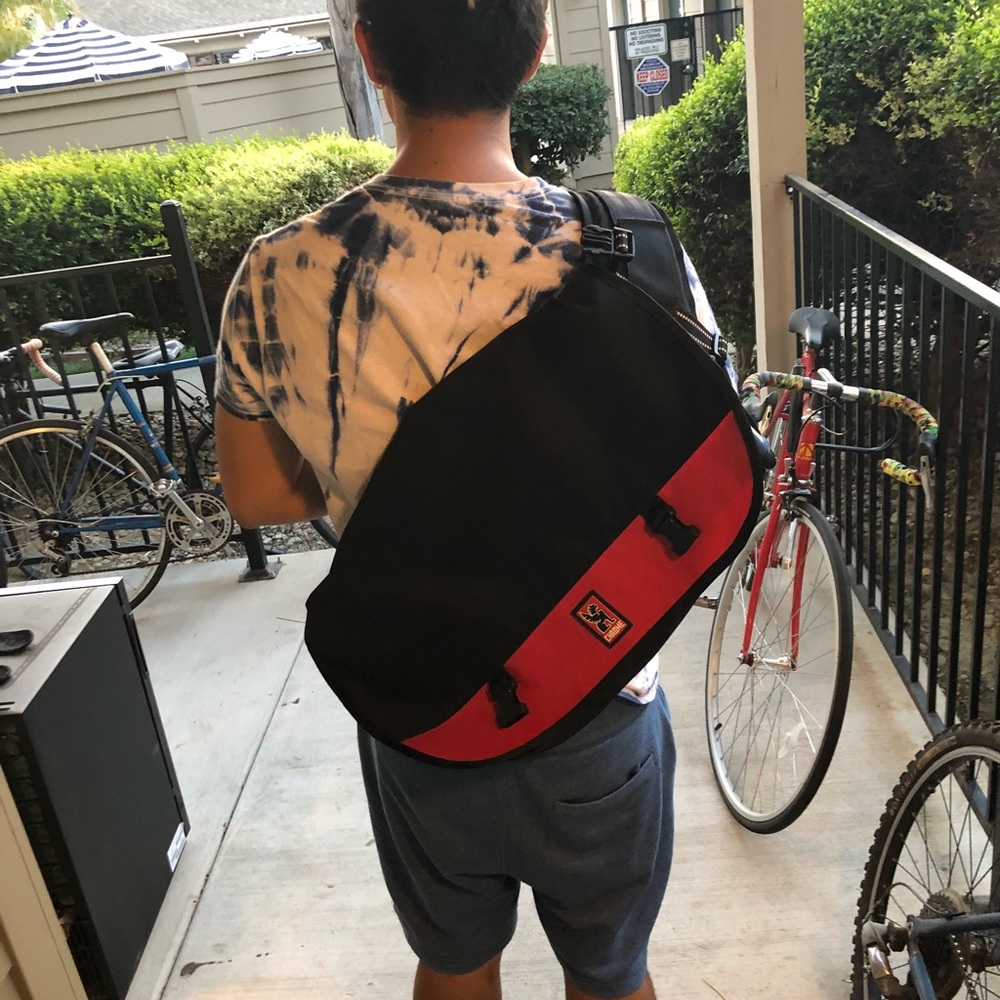 Chrome sling backpack